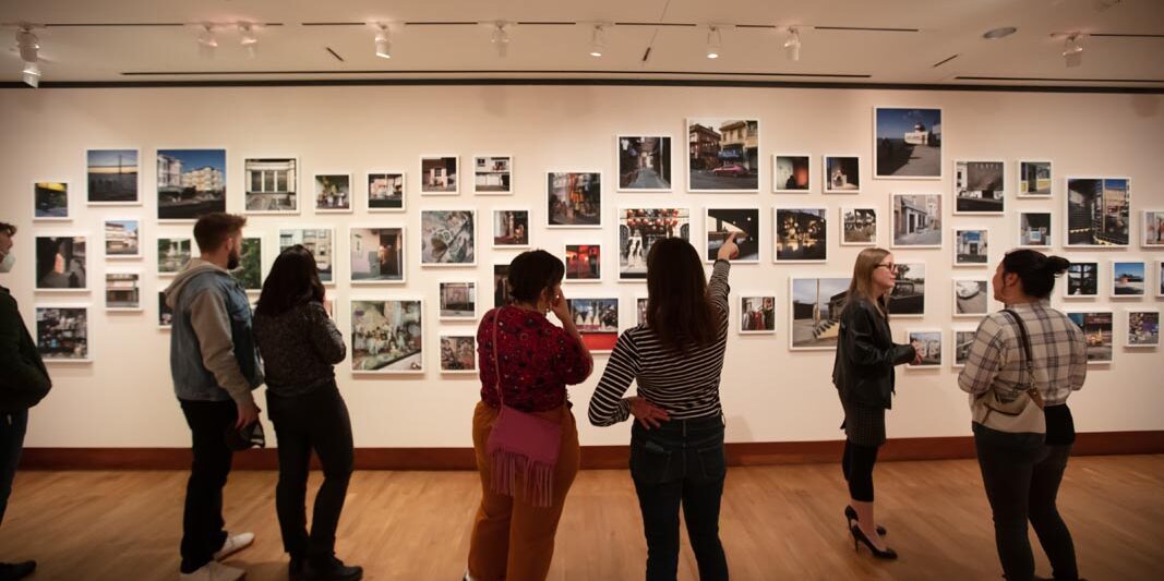 People exploring an art exhibit