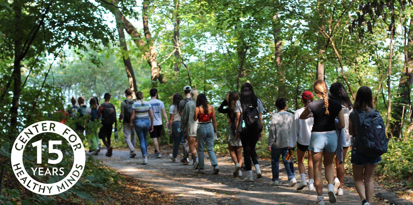 Students walking down lakeshore path