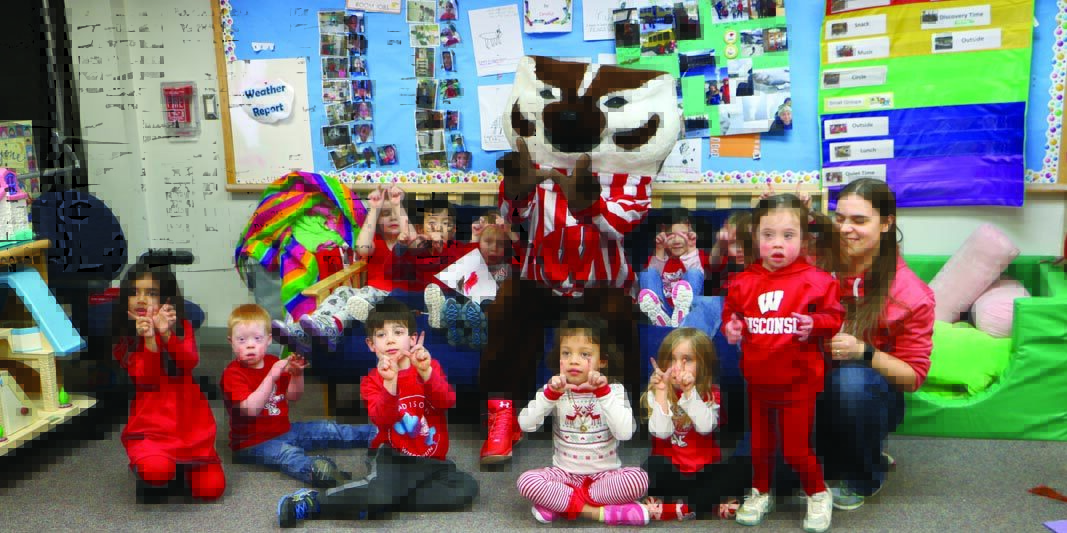 Bucky poses with kids