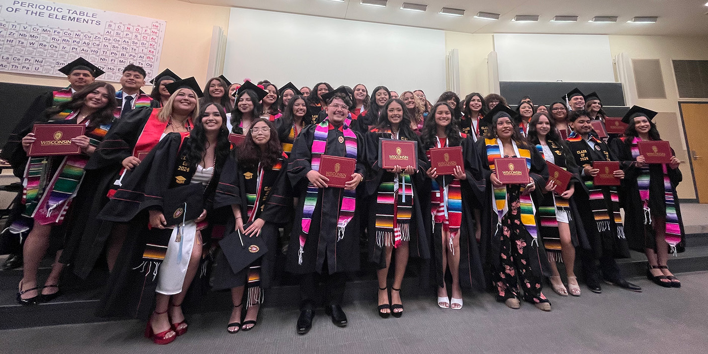Graduating students pose for a picture