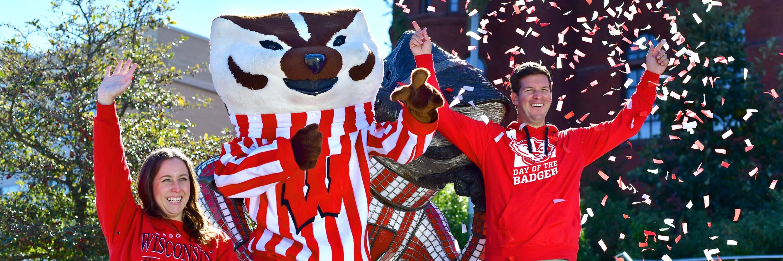 People posing with Bucky