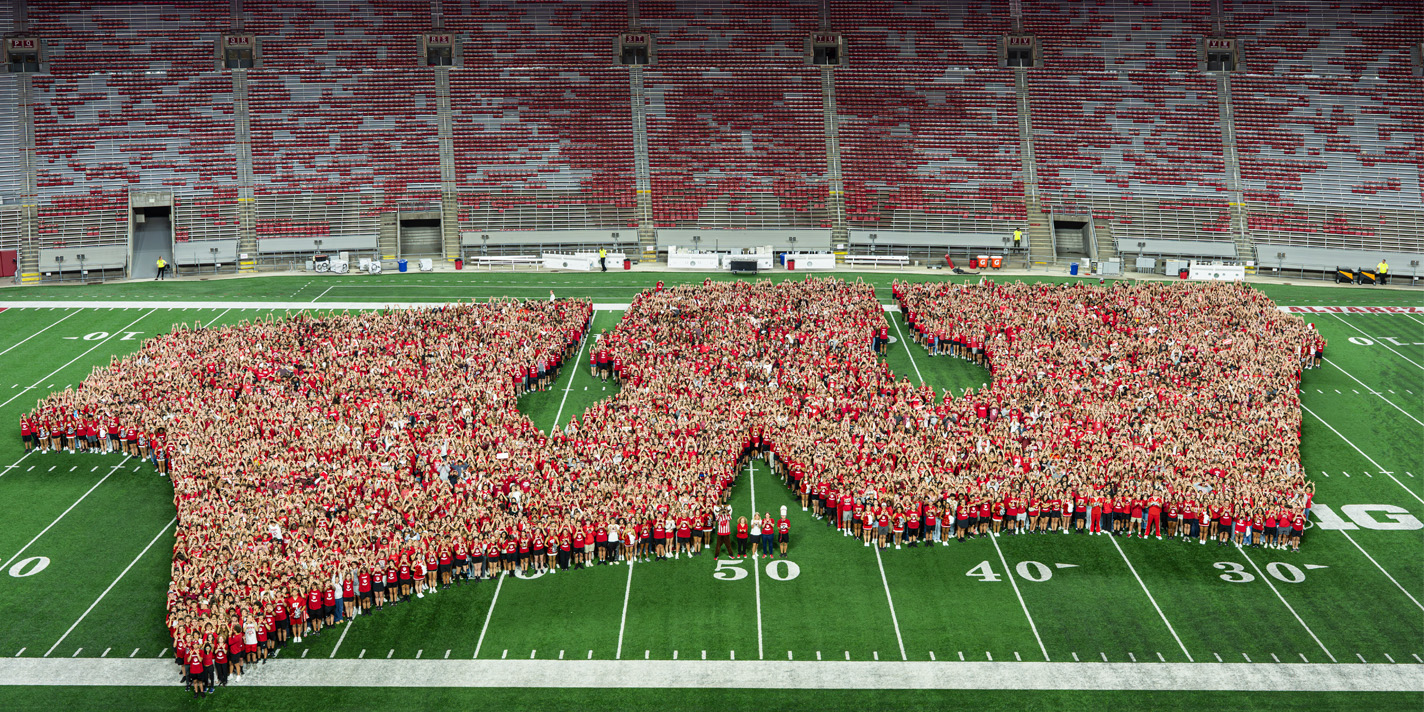 the Freshman class is shown on Camp Randall in the shape of a 'W'