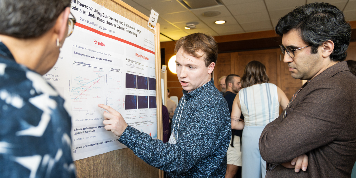 Student presents their research to a listening audience