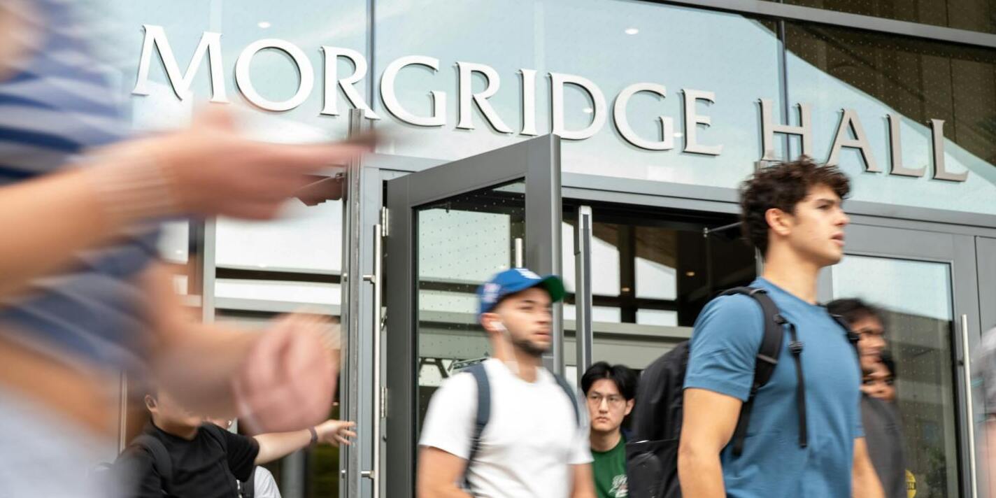 Students walking outside of Morgridge Hall
