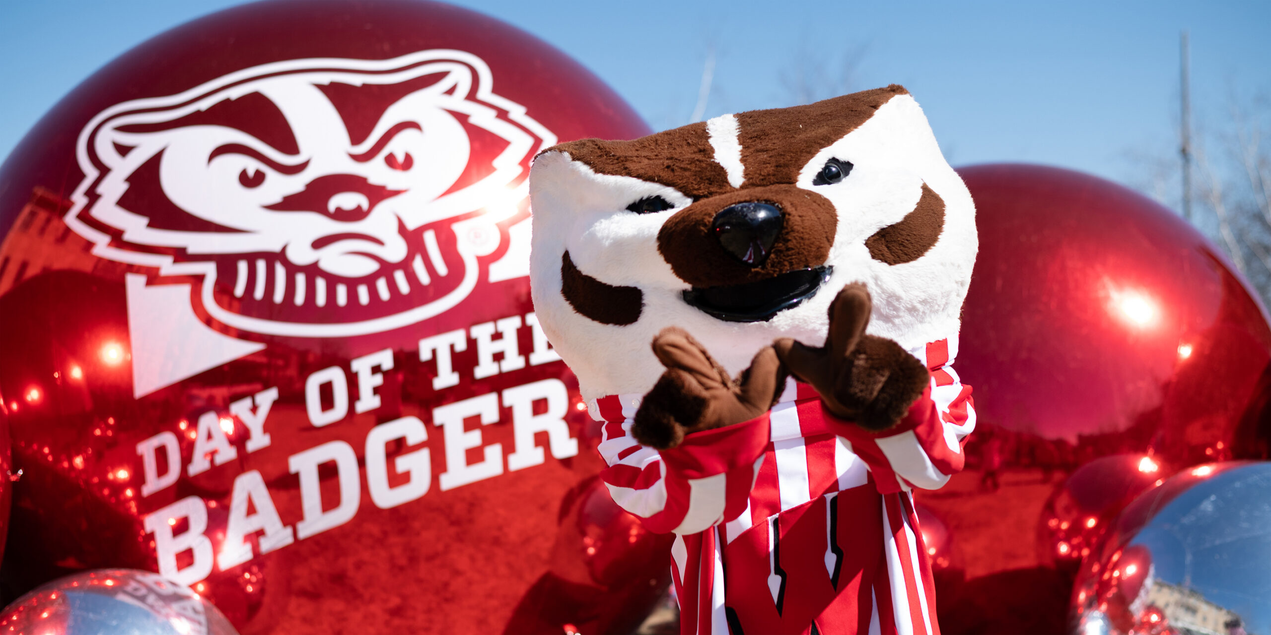 Bucky holding the "W"